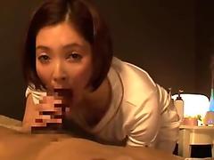 Pretty Asian massage girl uses her mouth to please her man